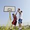 8310909-streetball-basketball-game-with-two-young-player-at-early-morning-on-city-court.jpg
